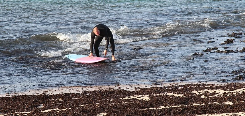 Ohn Surf Booties kann der Ein- und Ausstieg zum Problem werden